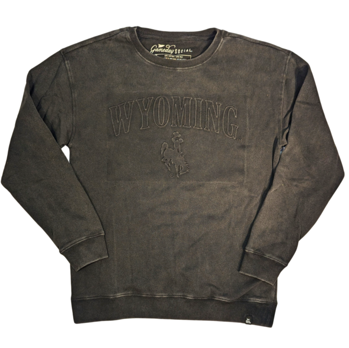 black crewneck sweatshirt with embossed/raised design. arced outline wyoming, tonal black, with tonal bucking horse under