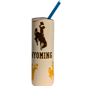 20-ounce skinny tumbler with scattered multicolored bucking horses and wyoming in brown wrapped horizontally