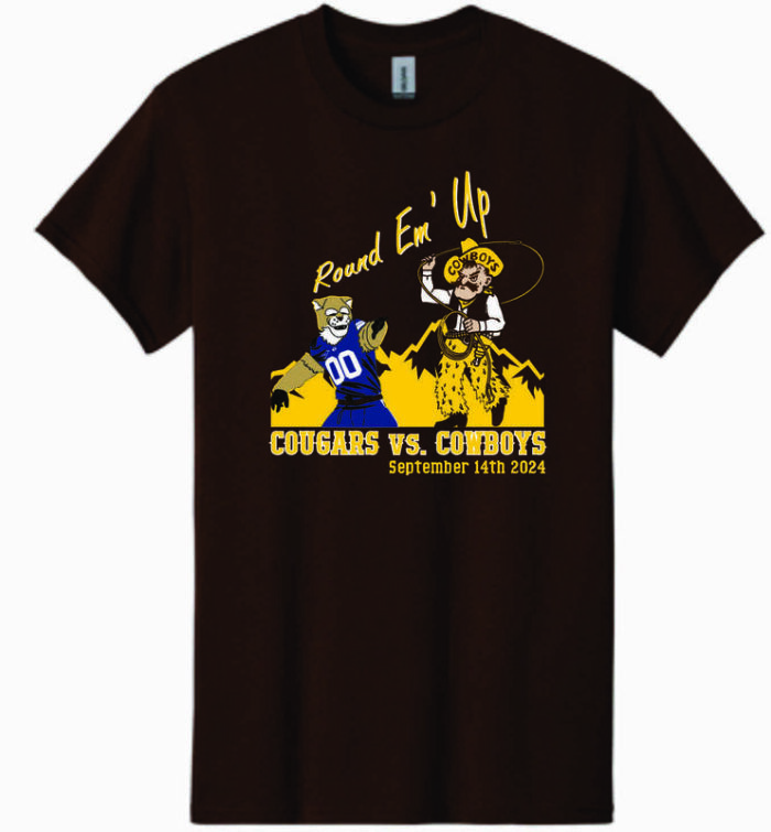 brown short sleeve tee with stripe out 2024 design center chest. At top of design, round em up in gold with pistol pete and cosmo the cougar under and cougars vs. cowboys at bottom