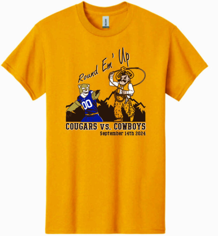 brown short sleeve tee with stripe out 2024 design center chest. At top of design, round em up in gold with pistol pete and cosmo the cougar under and cougars vs. cowboys at bottom