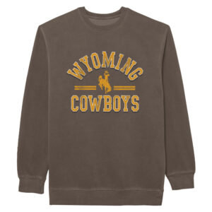 brown crewneck sweatshirt with design center chest in all gold with white outline. design is Wyoming arced, bucking horse under and cowboys at bottom.