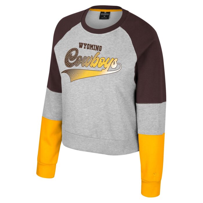 youth brown gold and grey crewneck. body is grey with design center chest. small wyoming in brown at top and large cowboys under in script with gradient brown to gold. Color blocked shoulders in brown and lower sleeve in gold