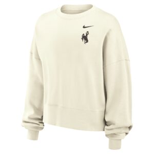 cream colored womens crewneck sweatshirt. on left chest small nike swoosh with bucking horse under, both in black