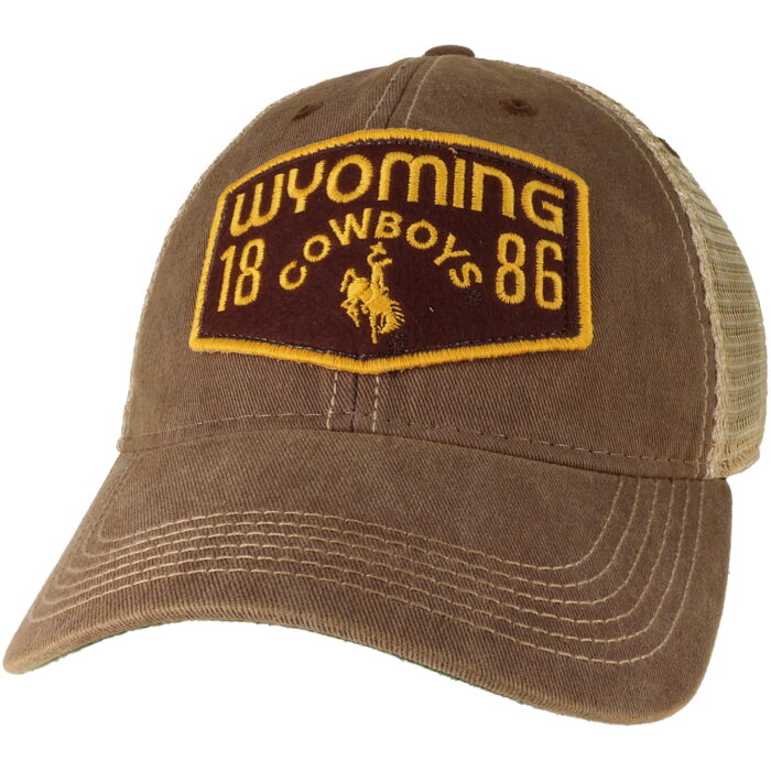washed light brown adjustable, unstructured hat with tan mesh back that has a Wyoming Cowboys 1886 fabric patch on the front.