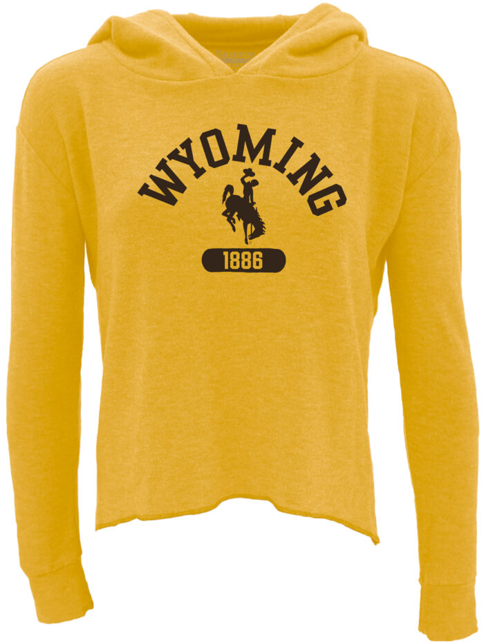 gold womens hodded long sleeve with brown design center chest. design is brown arched wyoming with bucking horse below and 1886 below that