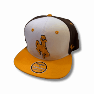 front of flat bill hat with white and brown body. gold bill and with white front and brown back. Large gold embroidered bucking horse with brown outline on front center