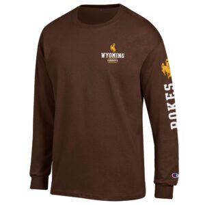 brown champion long sleeve with design left chest. has gold bucking horse with wyoming lettering in white below and cowboys below. white pokes and gold bucking horse on left sleeve