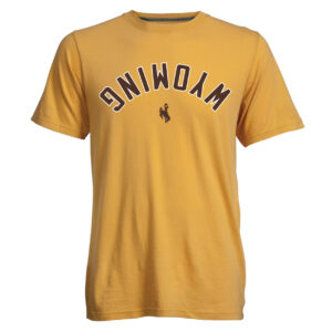 gold tee shirt with upside down wyoming lettering in brown with white outline all centered on chest. has brown bucking horse below arch