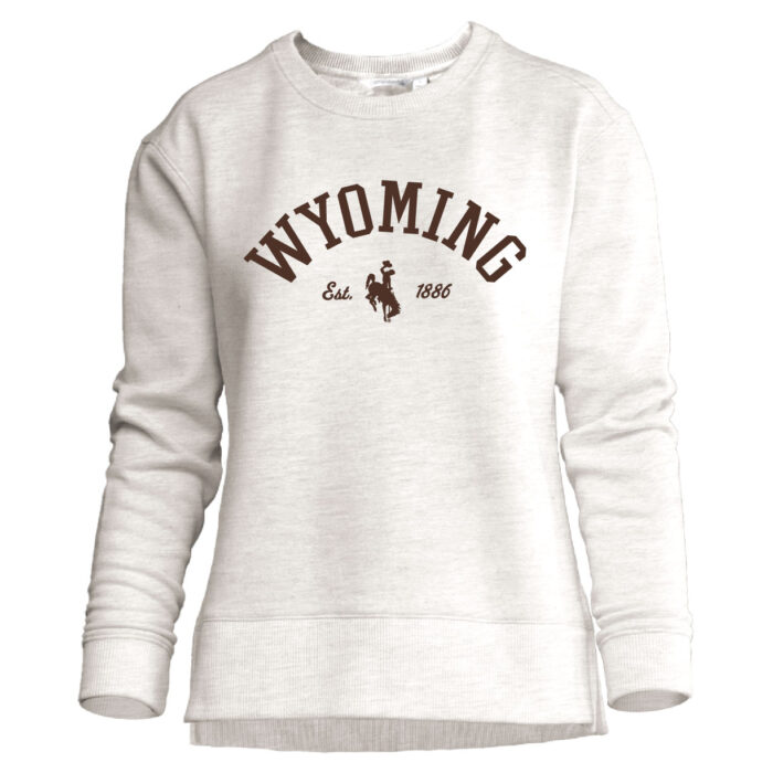 oatmeal women's crewneck with brown design center chest. design is arched wyoming lettering with est. bucking horse 1886 below going left to right