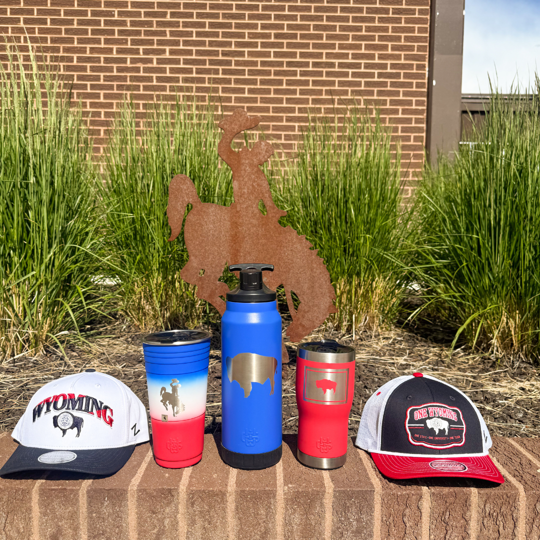 pictured is two state flag hats on the outside of three red white and blue tumblers