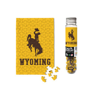 gold puzzle that comes in puzzle case. is gold puzzle with brown bucking horse with cowboys lettering below