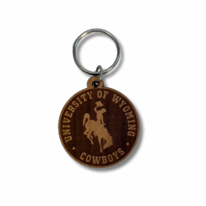 circle key ring to go on keychain. has metal holder to attach. has etched design in wood and is arched university of wyoming with bucking horse below and cowboys below that