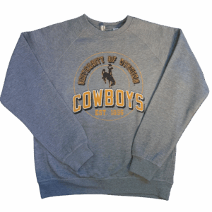 grey long crewneck with circle design center chest. circle has university of wyoming lettering arched inside with bucking horse and cowboys lettering below. est 11886 at bottom