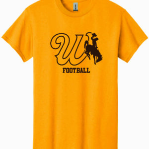 gold tee shirt with design center chest. design is cursive w with bucking horse to the left. has football lettering centered below