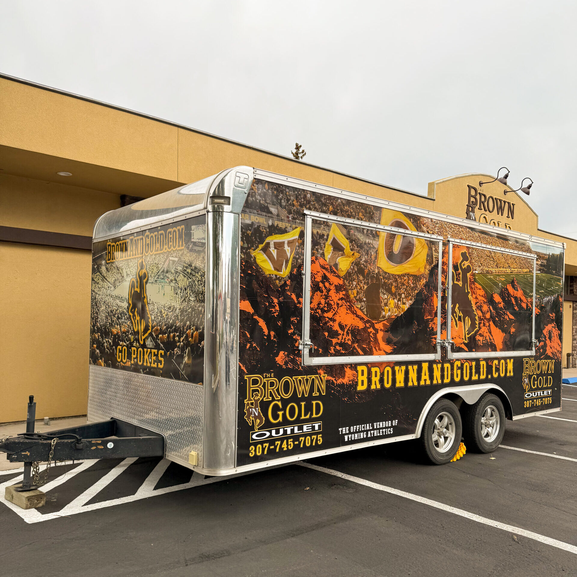 picture of our traveling trailer parked in front of our store