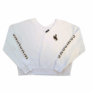 white v-neck crewneck. has wyoming lettering on left sleeve and cowboys lettering on right sleeve. has brown bucking horse with gold outline on left chest