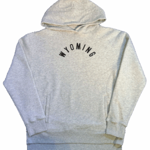 oatmeal women's sweatshirt with arched brown wyoming lettering center chest. has pocket on front