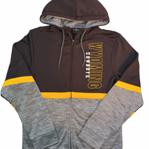 brown full zip jacket with brown on top to grey on bottom. has gold line to separate colors. has design on left chest and it is going vertically. design is outline gold wyoming lettering with white cowboys below
