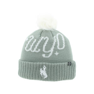 grey beanie with white pom on top. has wyo script across front with white embroidered bucking horse centered on ribbed section