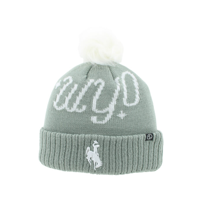 grey beanie with white pom on top. has wyo script across front with white embroidered bucking horse centered on ribbed section
