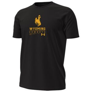 black under armour short sleeve with gold design center chest. design is bucking horse above wyoming lettering. has line below and cowboys below that. under armour logo at bottom left centered