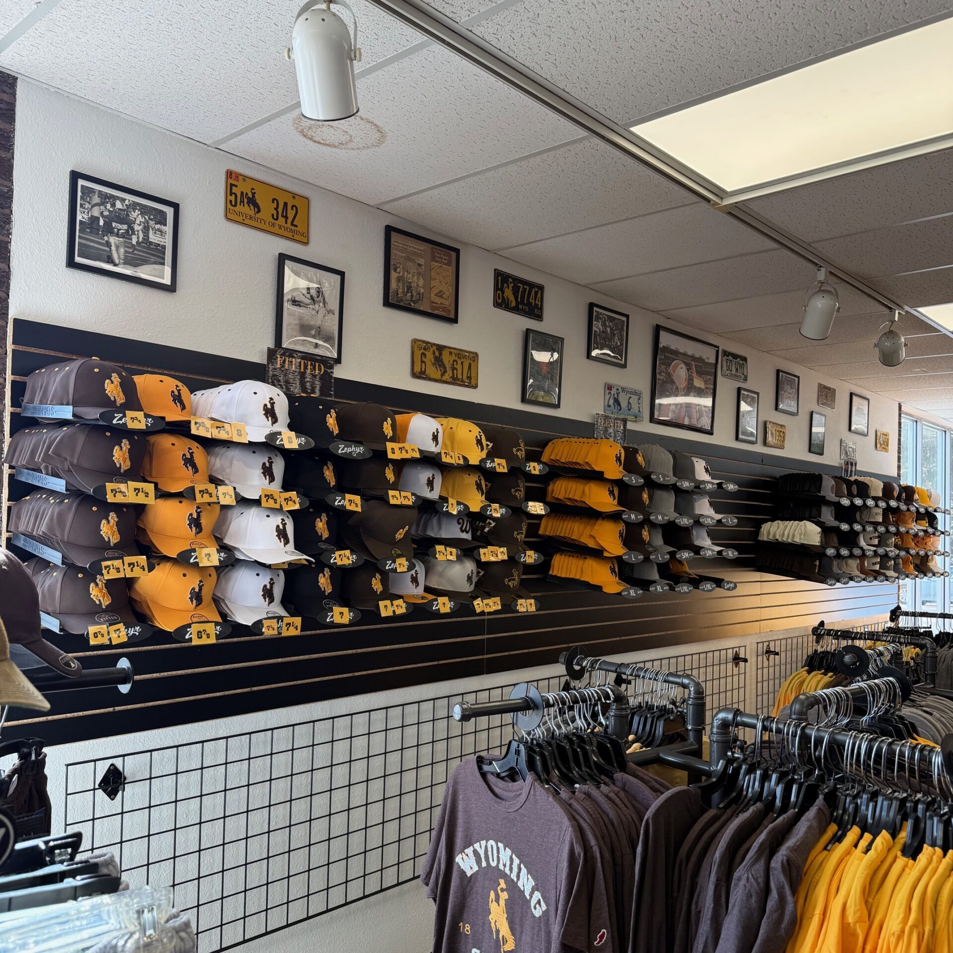 picture of our hat wall with new additions to it