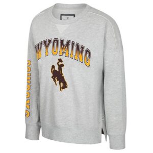 grey crewneck with design center chest. design is block wyoming with gradient brown and gold fill. has brown bucking horse below with gold outline. has block cowboys going down left sleeve in gold