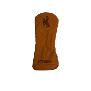 front of brown leather headcover with brown quilted stitching all over. has brown embroidered bucking horse centered on top with brown embroidered lettering centered at bottom